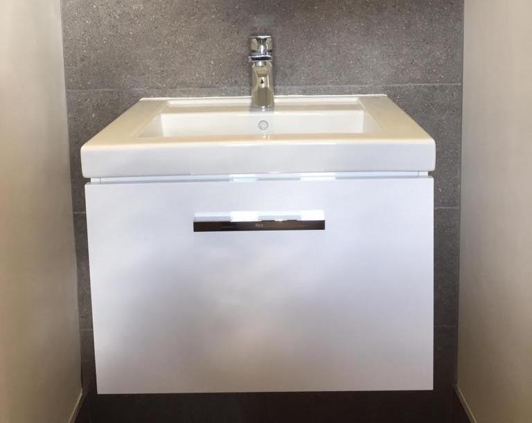 Contemporary wall-hung Roca sink and tap